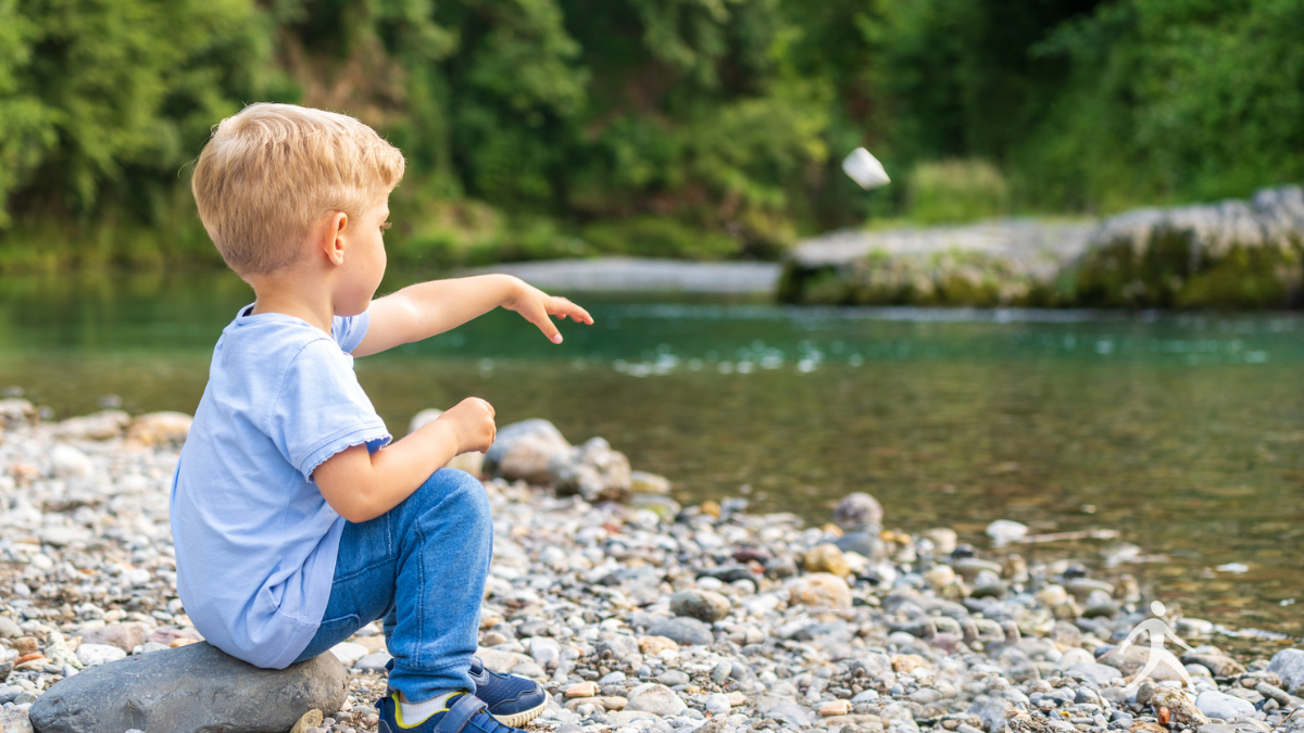 Releasing a stone into the water representing casting your cares on God
