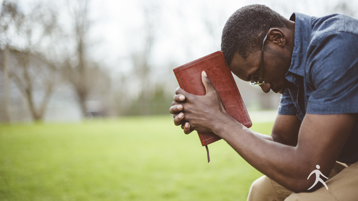Open Bible and journal on a desk for turning worry into prayer