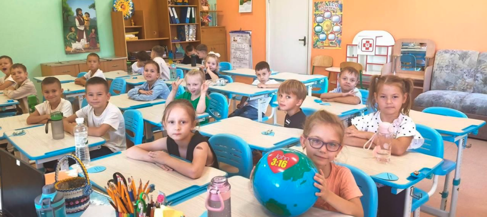 Children participating in a Walk Thru the Bible lesson inside a Ukrainian public school